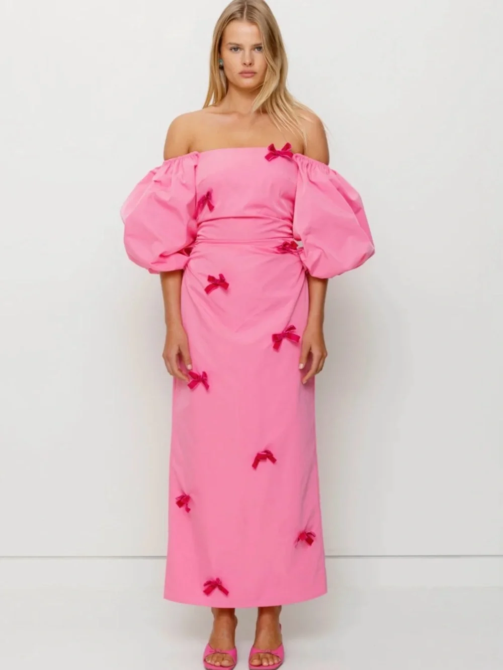 The Wolf Gang Amar Dress | Off-Shoulder Pink Puff-Sleeve Midi Dress with Bows - Picture 2 of 9